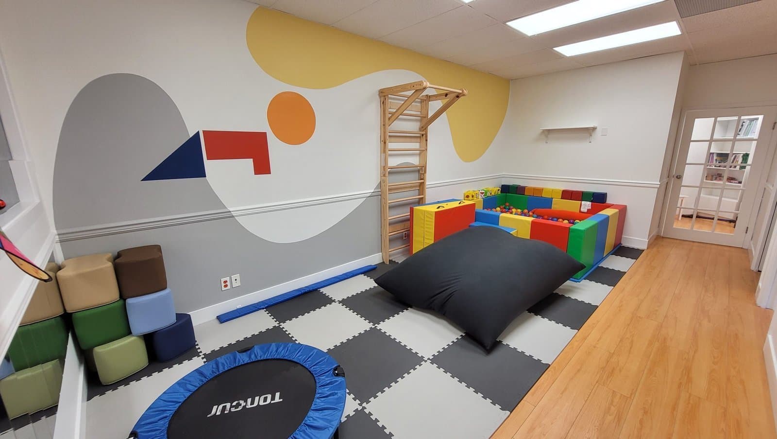 KidStart occupational therapist working with child on sensory integration activities