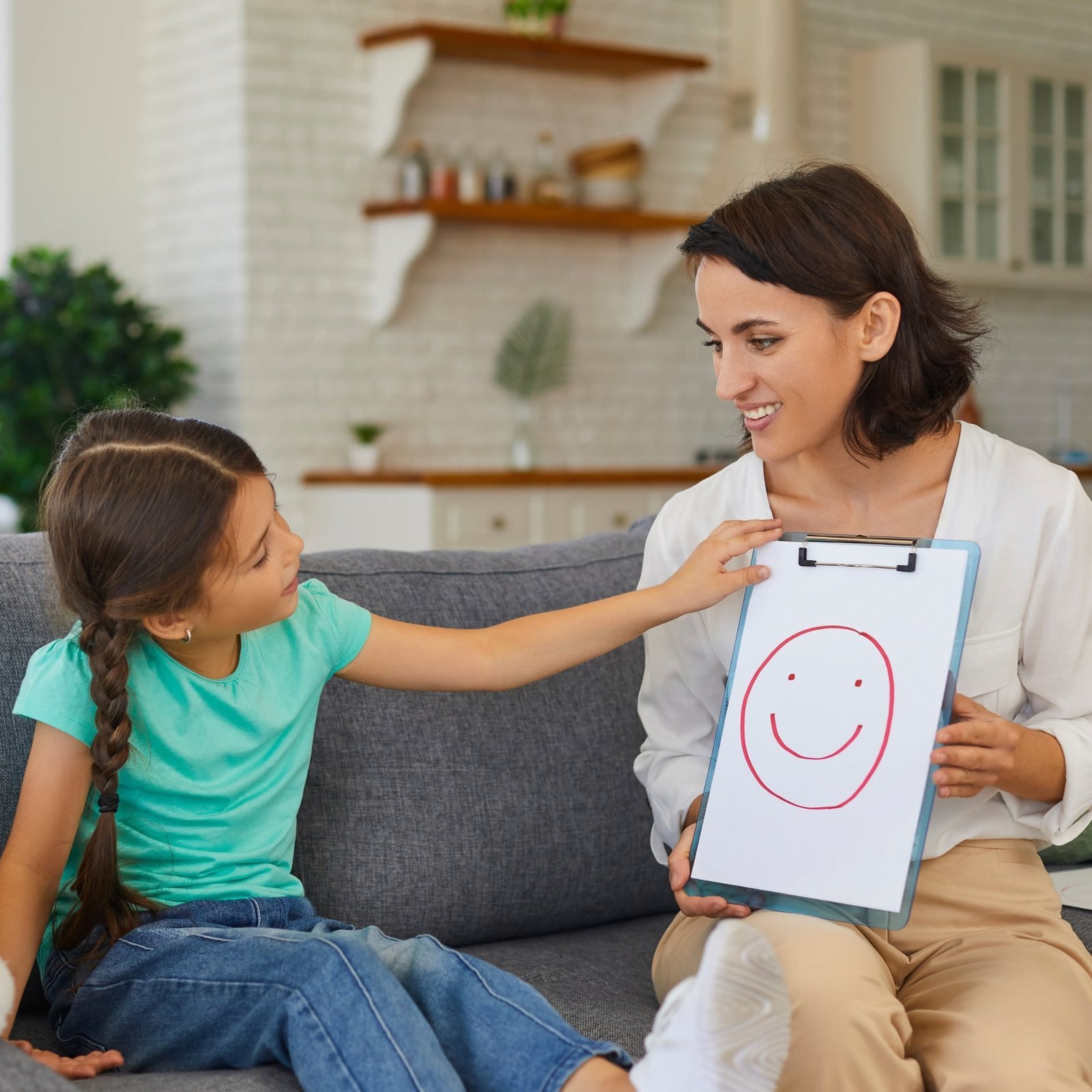 Pediatric occupational therapist working with child at KidStart Burnaby BC